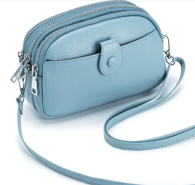 New leather fashion mobile phone bag in light blue, made of head layer cow leather, perfect for daily use.