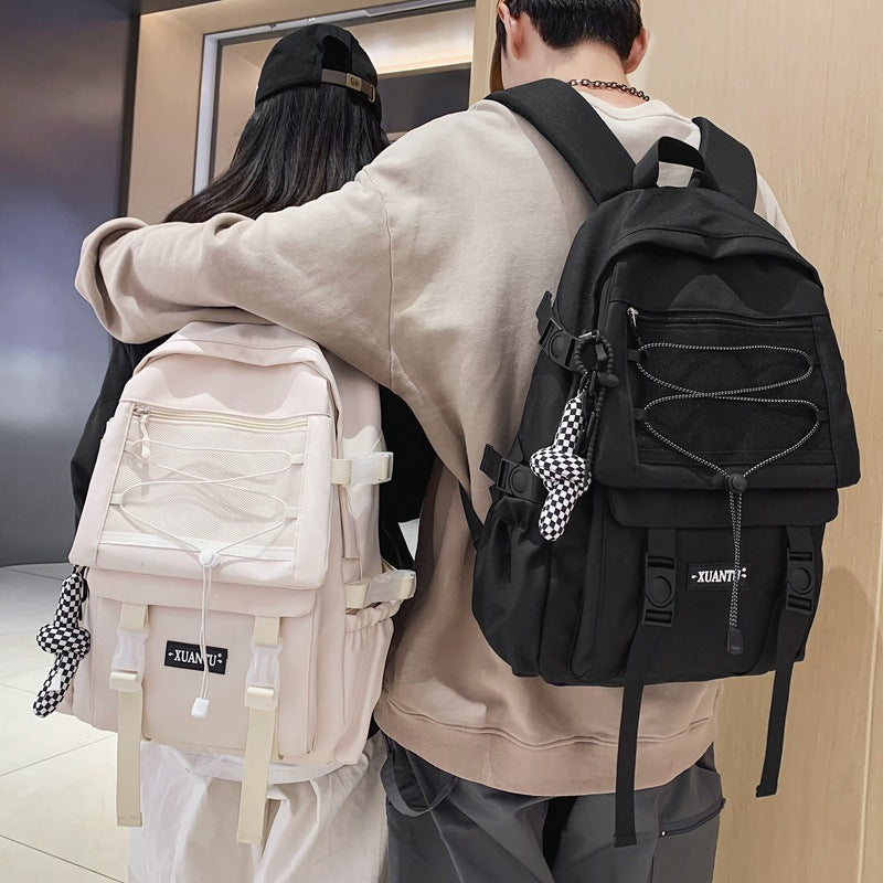 Two individuals showcasing versatile fashion bags in black and pink, perfect for everyday style and functionality.