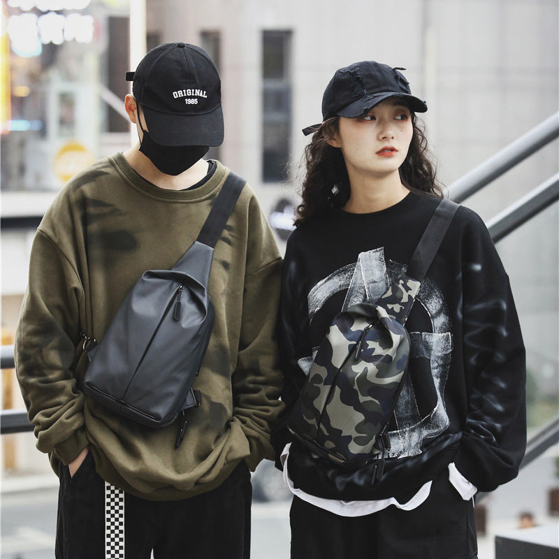 Men and women wearing casual outfits with an oxford cloth crossbody chest bag in outdoor urban setting.
