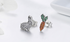 Rabbit and Carrot Silver Earrings with sparkling gems on a white background, perfect for stylish women.