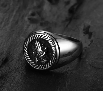 Nordic titanium steel ring featuring a sleek black design with a detailed emblem.