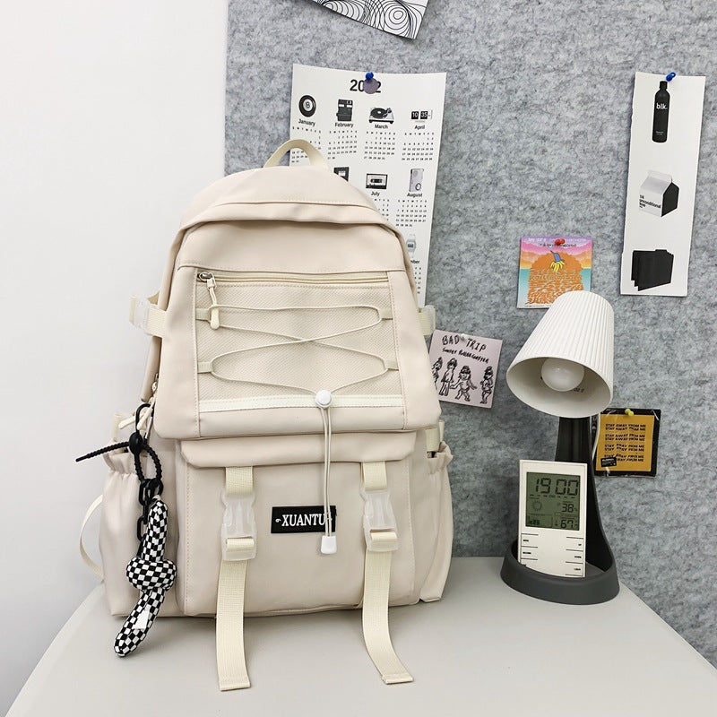 Stylish white student backpack for high school, perfect for essentials and comfort in school.