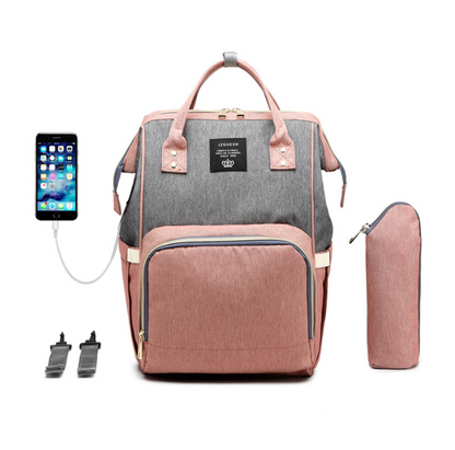 Large capacity mommy backpack with USB in pink and grey with phone charging feature.