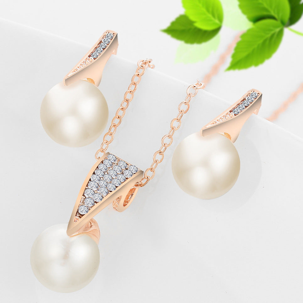 bridal pearl necklace and earrings set featuring elegant pearl and diamond accents.