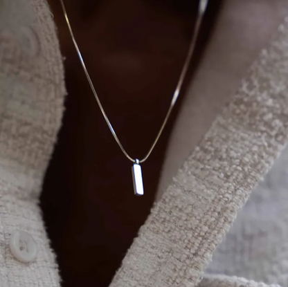Stainless Steel Celebrity Clavicle Chain necklace featured on a casual sweater outfit.