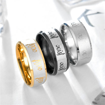 Simple Titanium Steel Couples Ring set in silver, black, and gold displaying English letters.