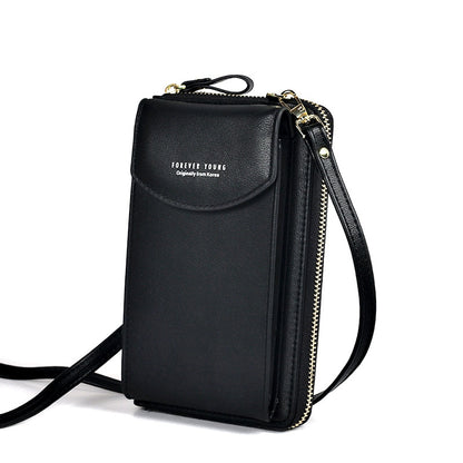 Mini satchel phone bag in sleek black leather with adjustable strap and zip closure.