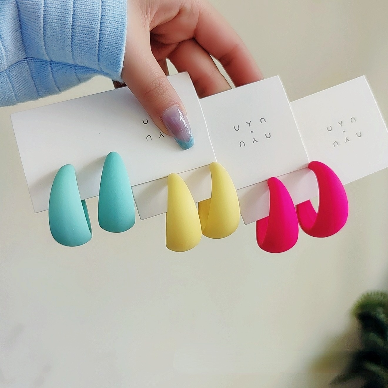 Candy color earrings for women in vibrant turquoise, yellow, and pink styles for parties and work.