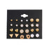 12 Pairs of Star and Moon Diamond Earrings Set displayed on a black card featuring various gold and diamond designs.