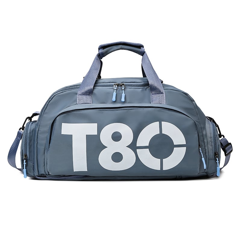 Outdoor multi-functional sports bag with wet dry separation in blue with sturdy handles and zippers.