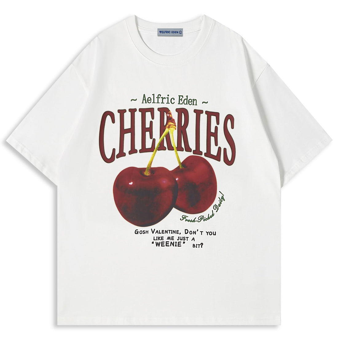 Aelfric Eden cherry print oversized graphic tee in white with a vibrant cherry design and playful text.