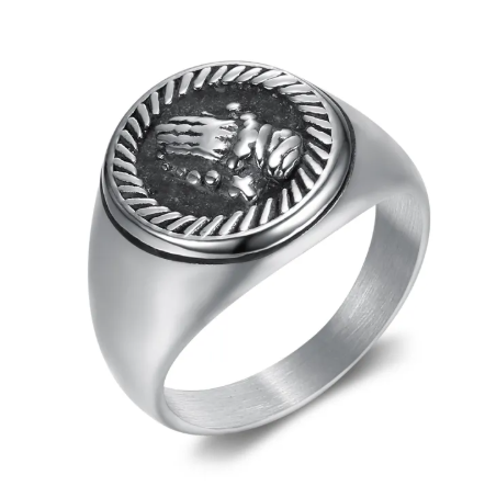 Nordic titanium steel ring featuring a sleek modern design with a textured circular emblem.