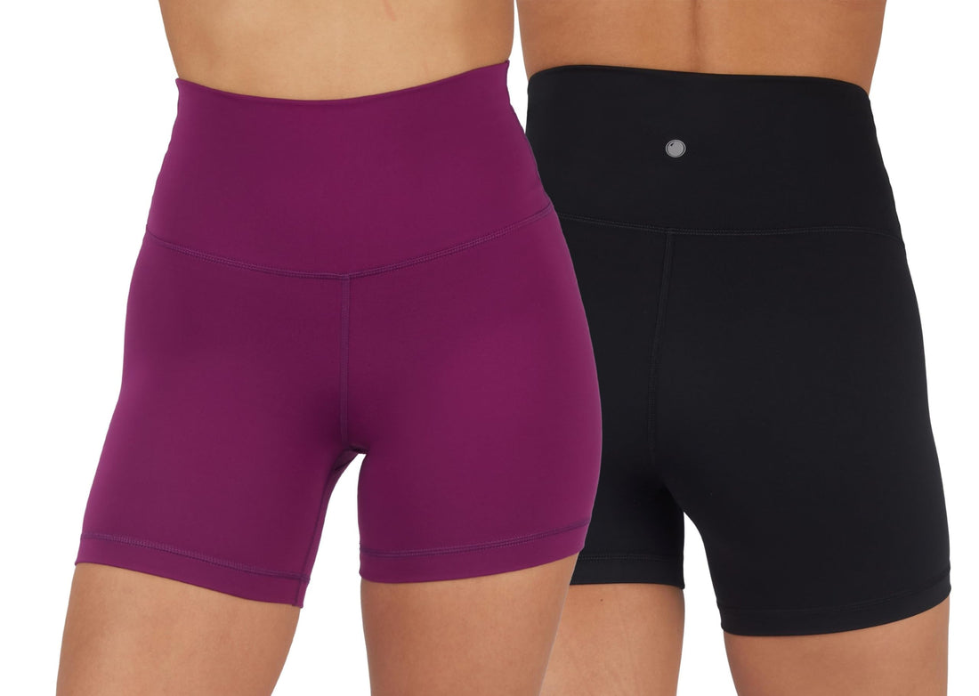 Yogalicious high waist squat proof biker shorts in Plum Caspia and Black, elastic-free, showing front and back view.