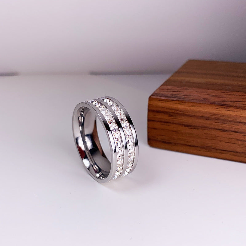 Double row zircon stainless steel ring for women showcasing elegance with sparkling stones and modern design.