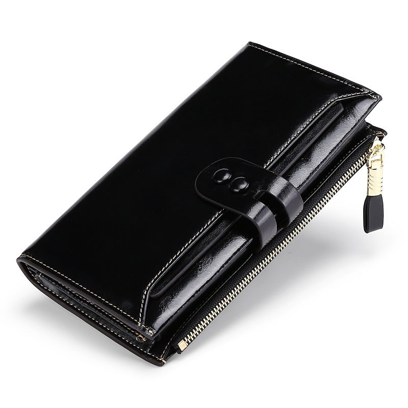 Vintage Oil Wax Leather Wallet in elegant black with zipper and button closure, showcasing its luxurious design.