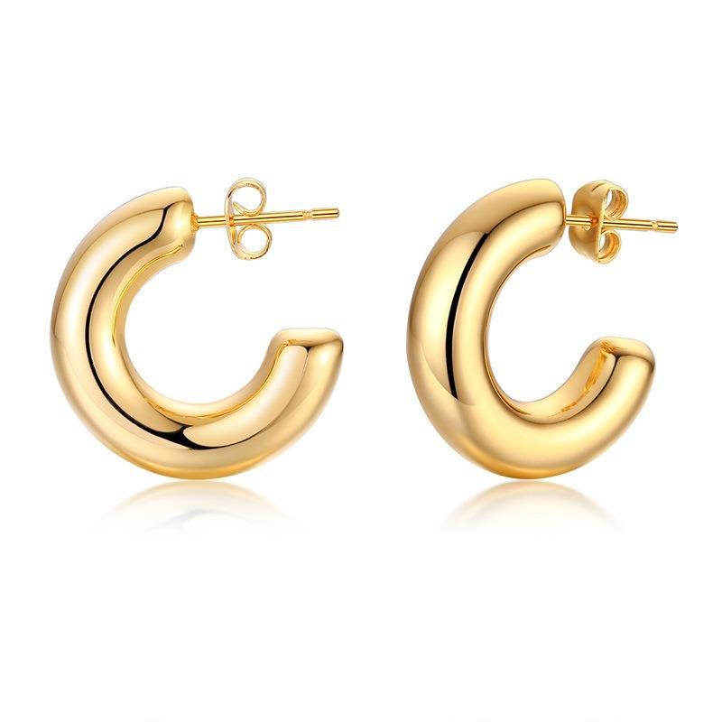Stainless steel hollow hoop earrings for women featuring a sleek and modern geometric design in golden finish.