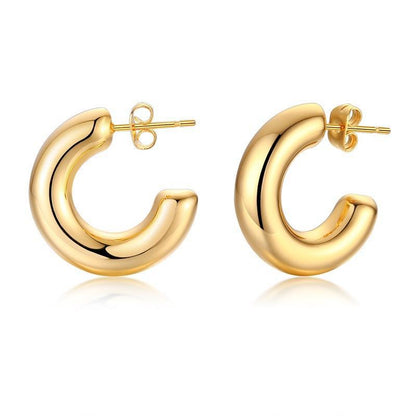 Stainless steel hollow hoop earrings for women featuring a sleek and modern geometric design in golden finish.