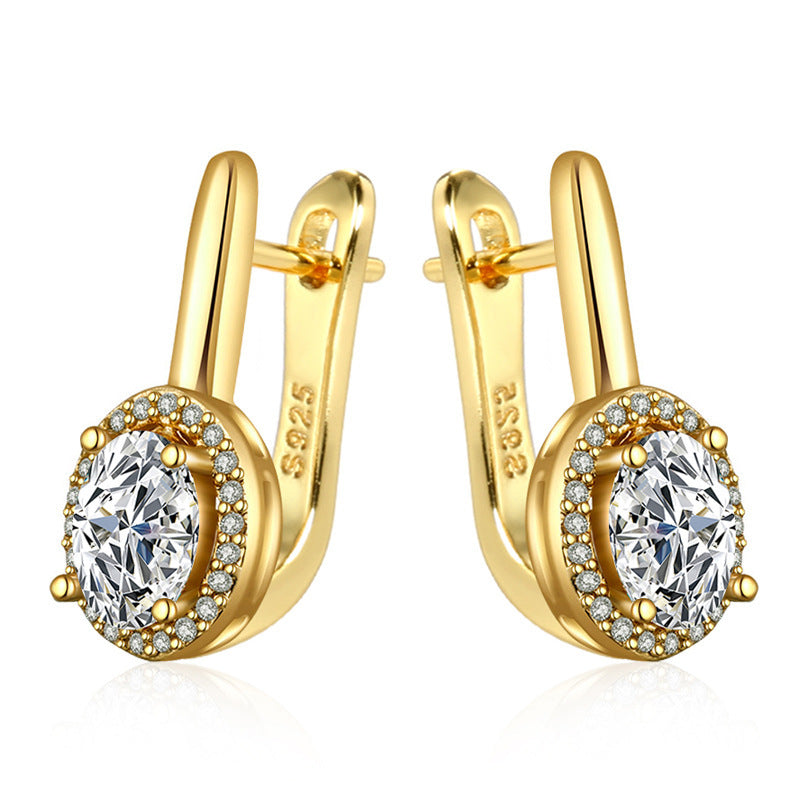 Zirconia circle stud earrings featuring exquisite gold plating and dazzling design, perfect for any occasion.