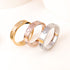 Rhinestone titanium steel bracelet ring set featuring gold, rose gold, and silver bands with heart designs.