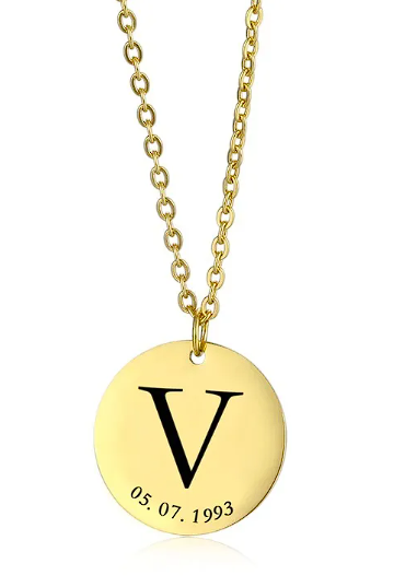 Personalized stainless steel clavicle chain featuring gold medallion with initial V and date engraving.