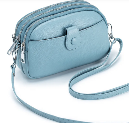 New leather fashion mobile phone bag in light blue, made of head layer cow leather, perfect for daily use.