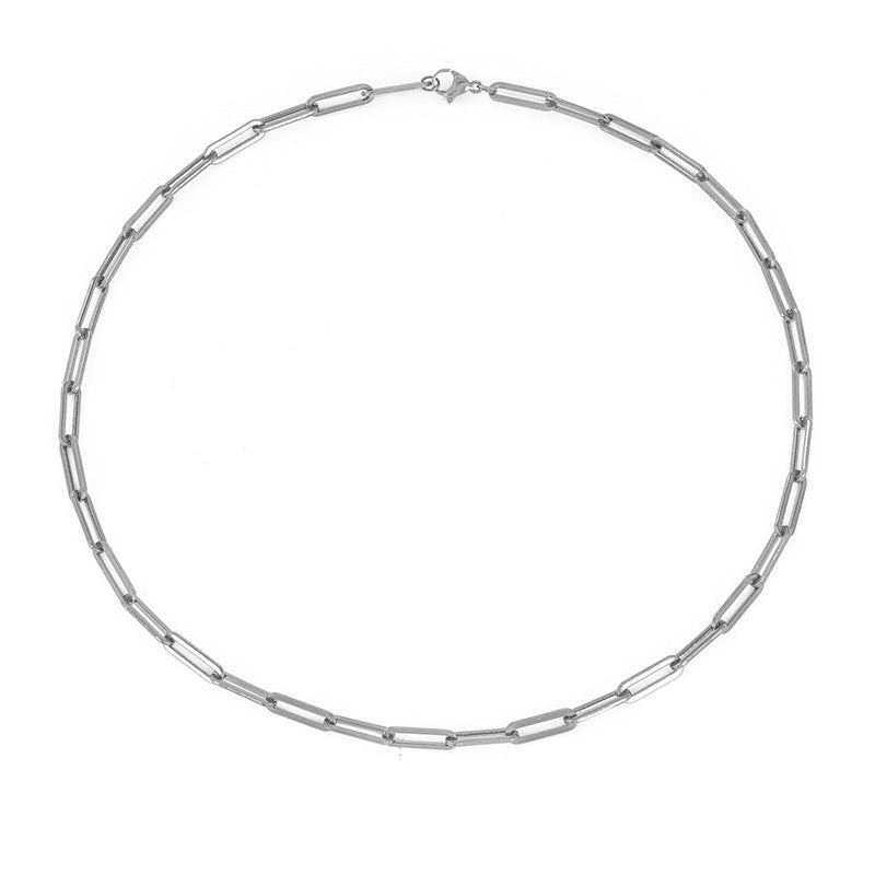 Gold-plated minimalist cross necklace in a sleek silver chain design for a modern look.