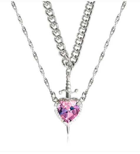 Gold heart and sword necklace set featuring a pink diamond pendant on a stainless steel chain.